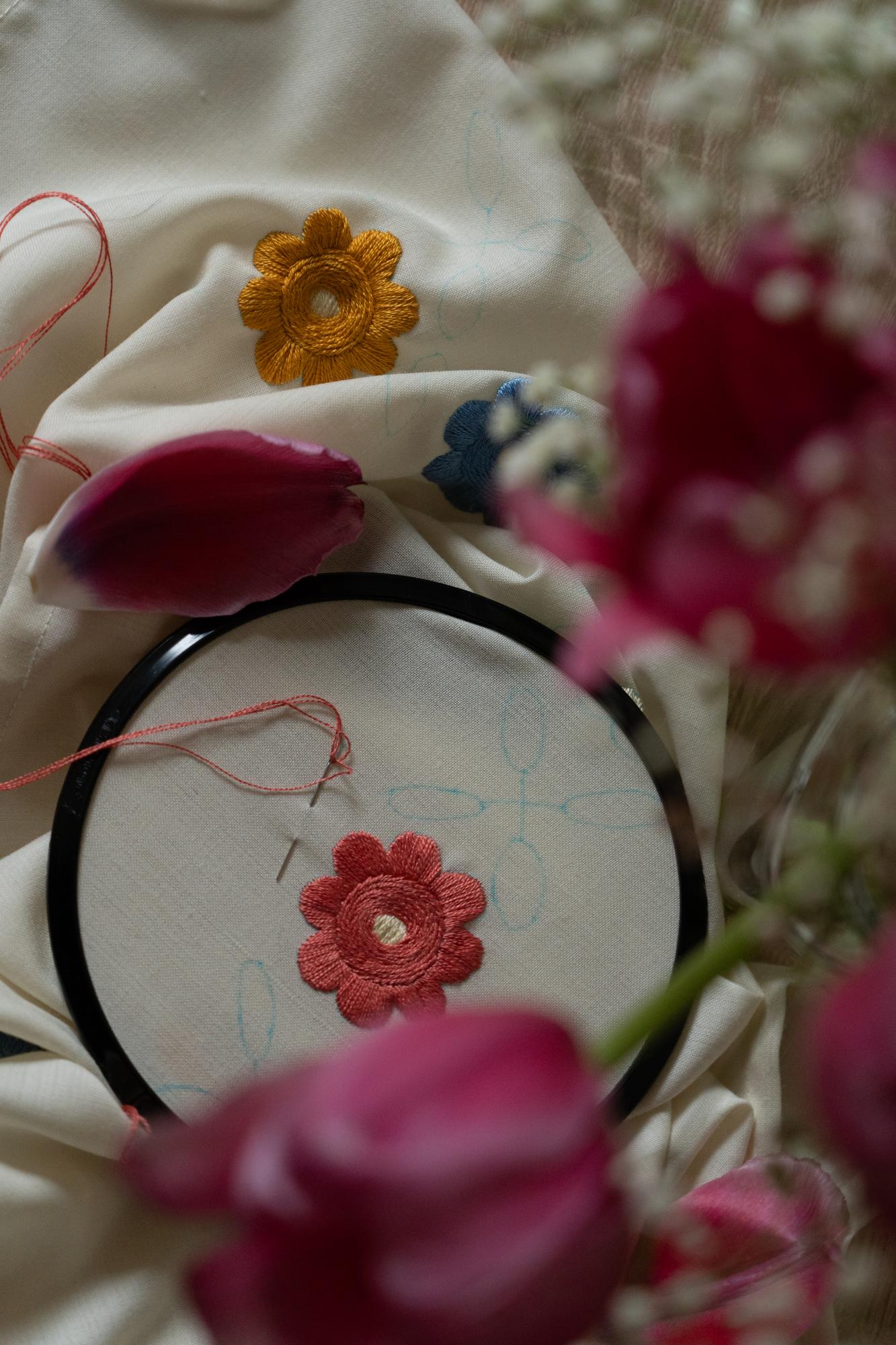 Close-up of hand embroidery on linen